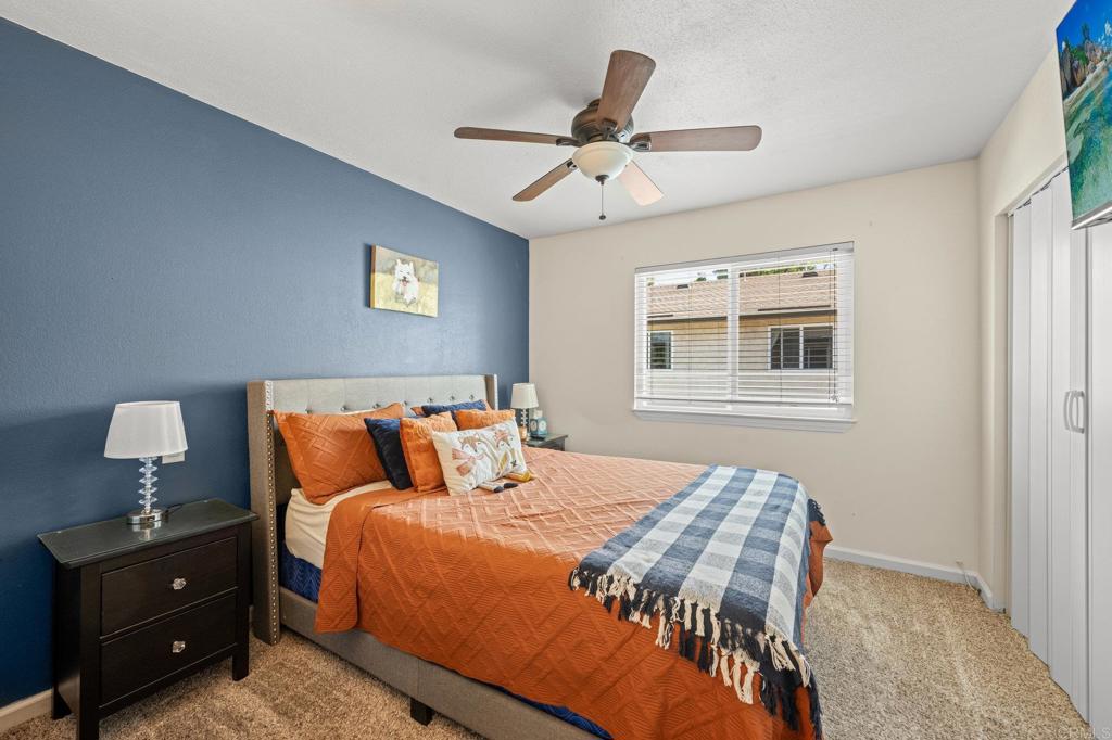 10323 Restful Court Santee, CA 92071 - Photo 9 of 30 a bedroom with a bed and window