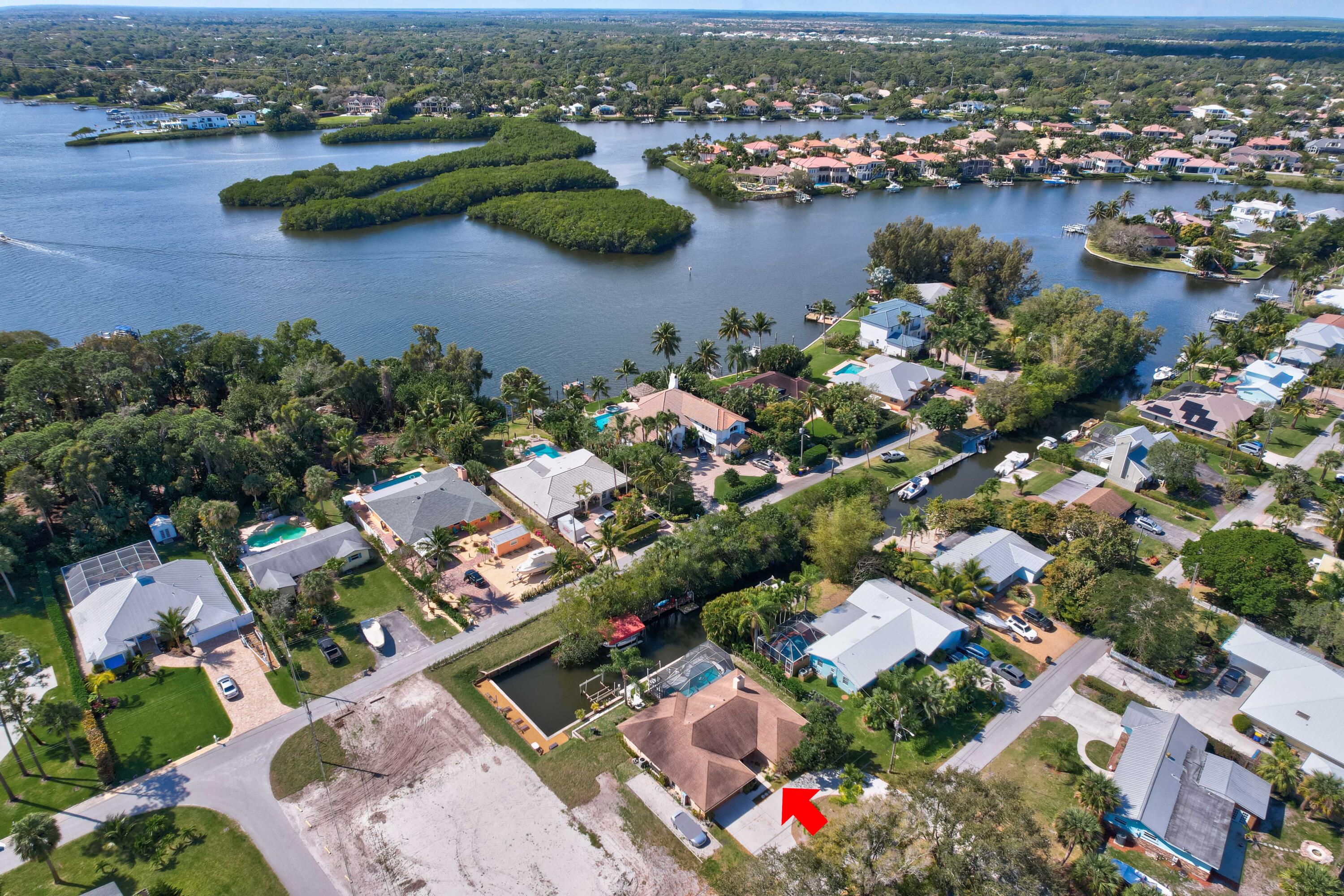 9524 Southeast Cove Point Street Jupiter, FL 33469 - Photo 2 of 58 Aerial looking southwest