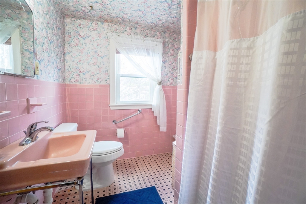 53 Yale Road Needham, MA 02494 - Photo 18 of 21 a bathroom with a sink toilet and shower