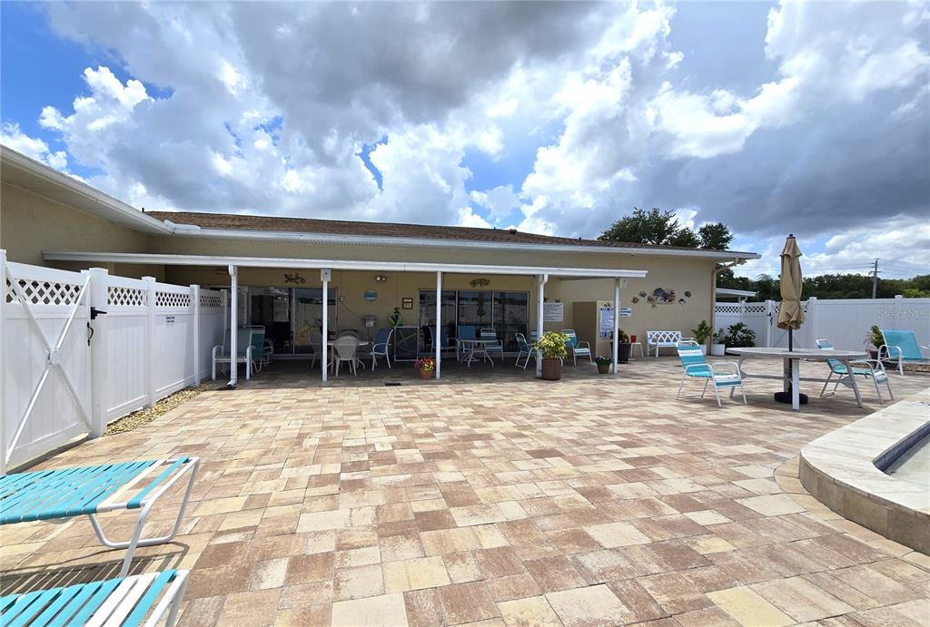 5619 Bayshore Road, Unit 435 Palmetto, FL 34221 - Photo 52 of 56 a view of a house with sitting area and covered with snow