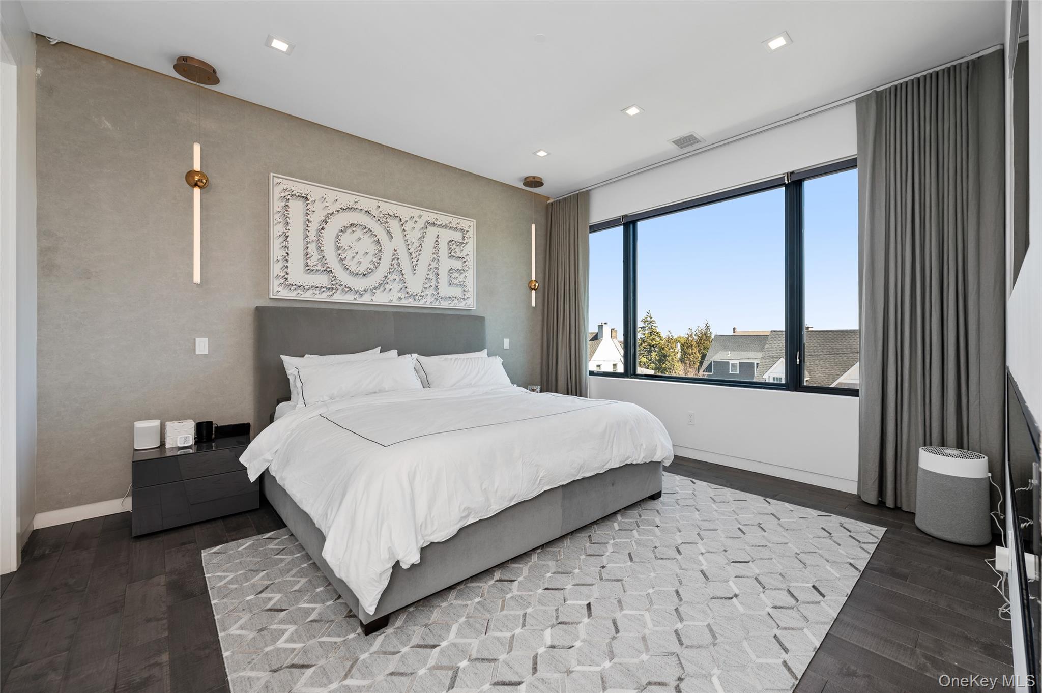 46 Nantwick Street Lido Beach, NY 11561 - Photo 17 of 50 a bedroom with a large bed and a large window