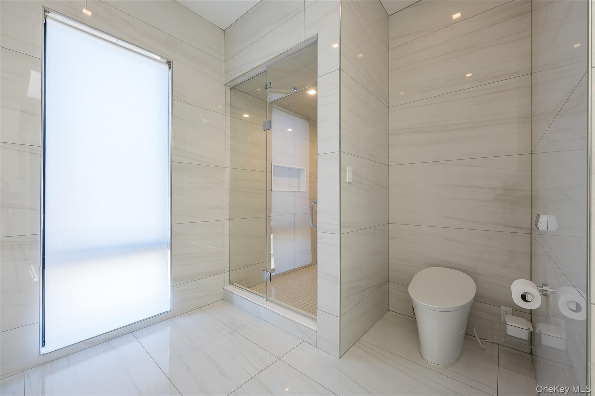 46 Nantwick Street Lido Beach, NY 11561 - Photo 20 of 50 a bathroom with a toilet and shower