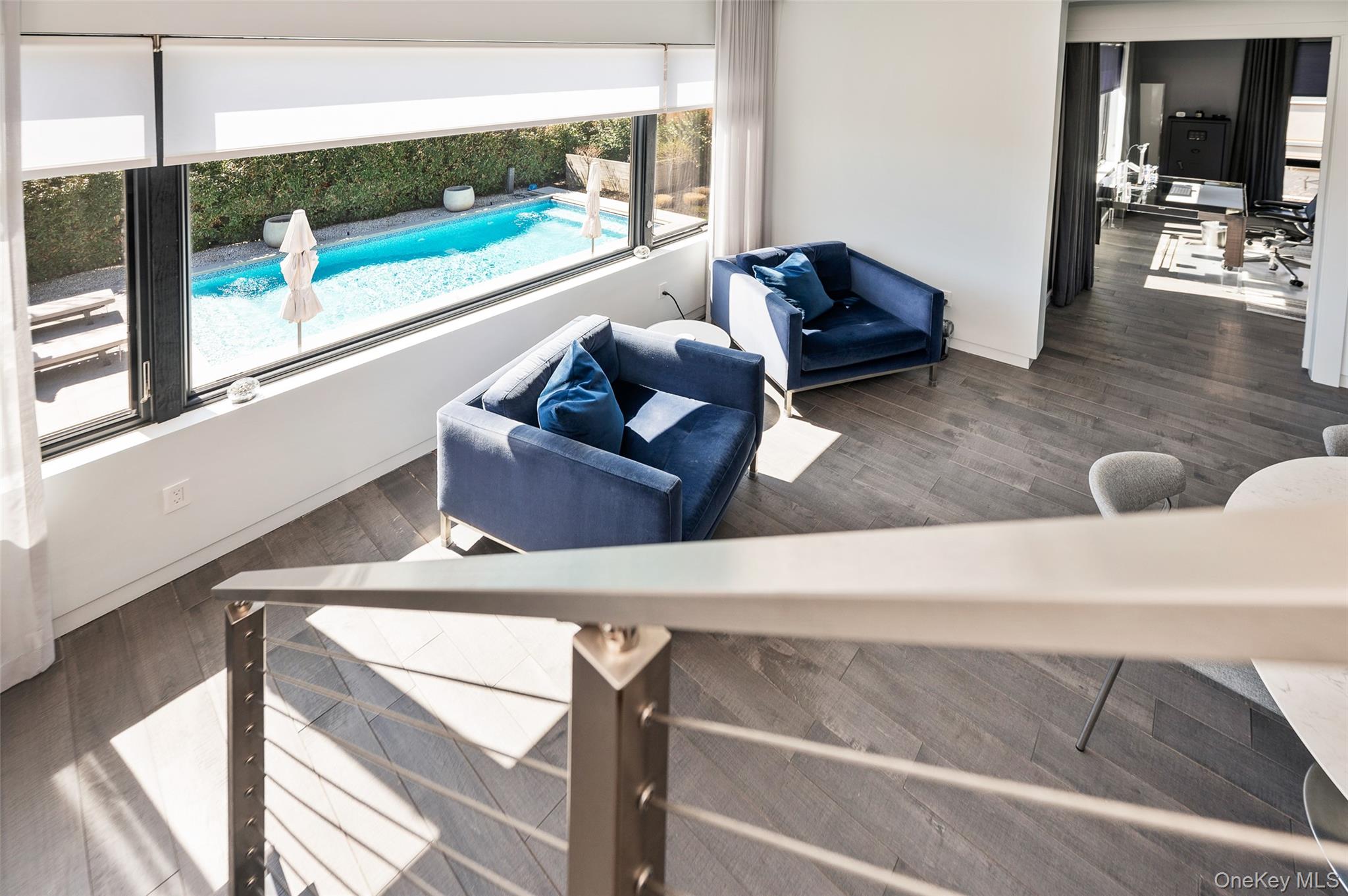 46 Nantwick Street Lido Beach, NY 11561 - Photo 22 of 50 a living room with furniture and a floor to ceiling window