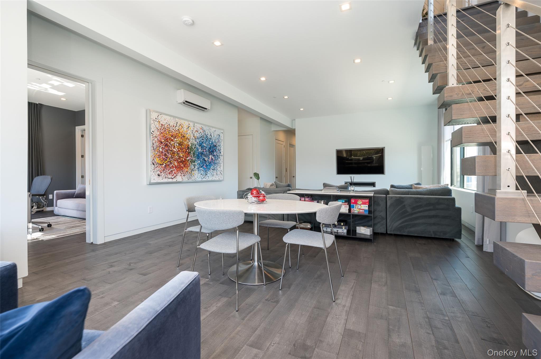 46 Nantwick Street Lido Beach, NY 11561 - Photo 25 of 50 a living room with furniture and a flat screen tv