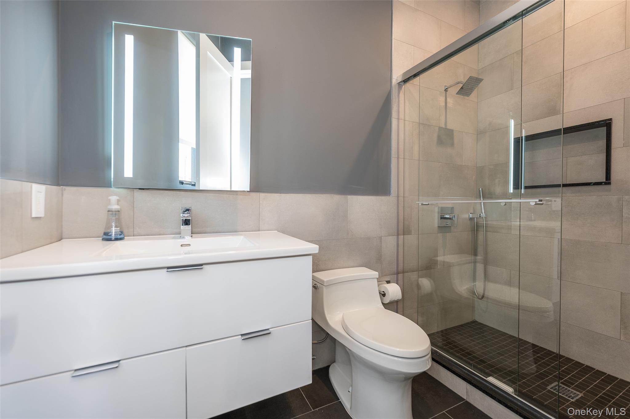 46 Nantwick Street Lido Beach, NY 11561 - Photo 28 of 50 a bathroom with a sink toilet and shower