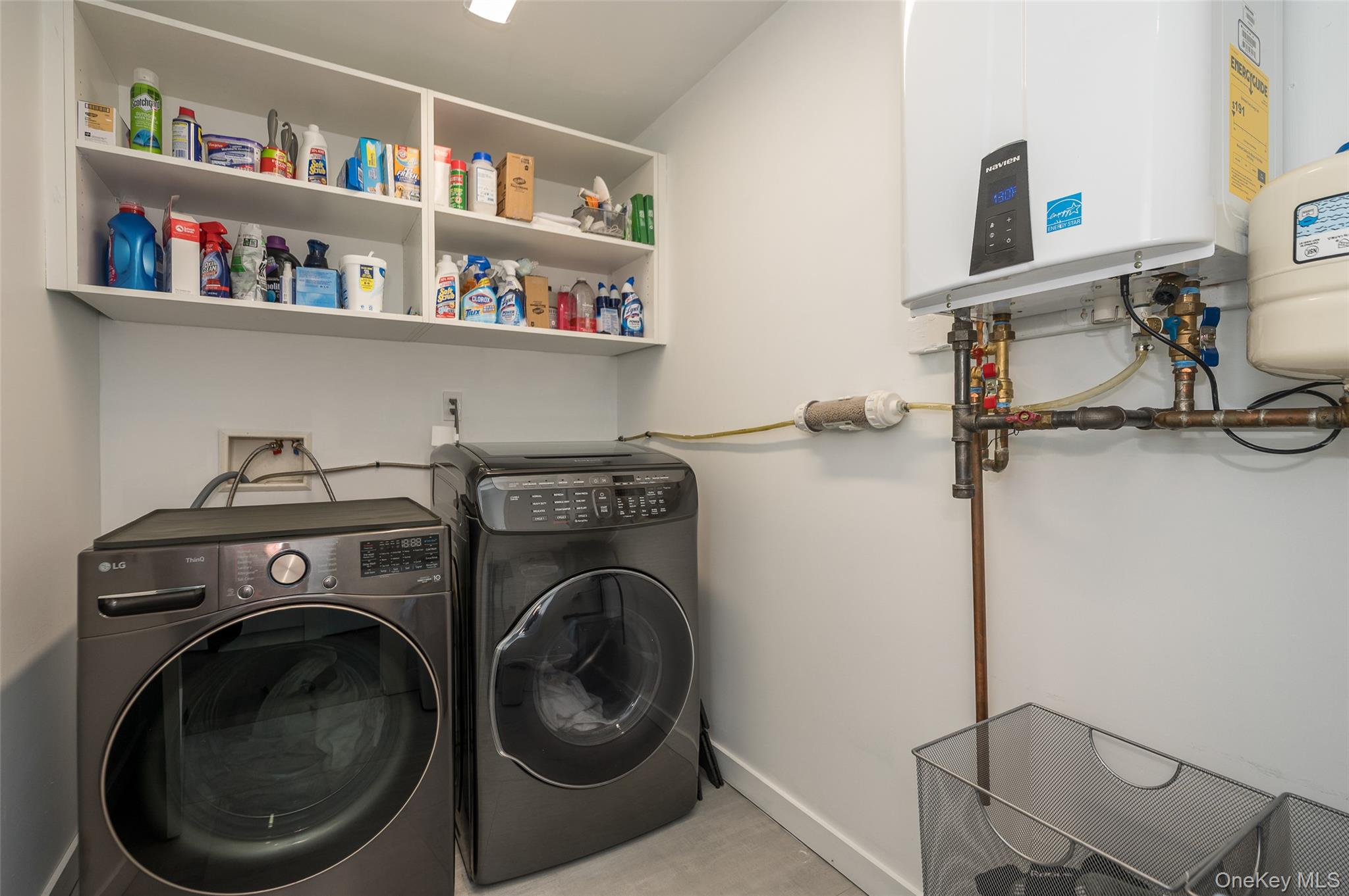 46 Nantwick Street Lido Beach, NY 11561 - Photo 33 of 50 a view of a storage and utility room with washer and dryer