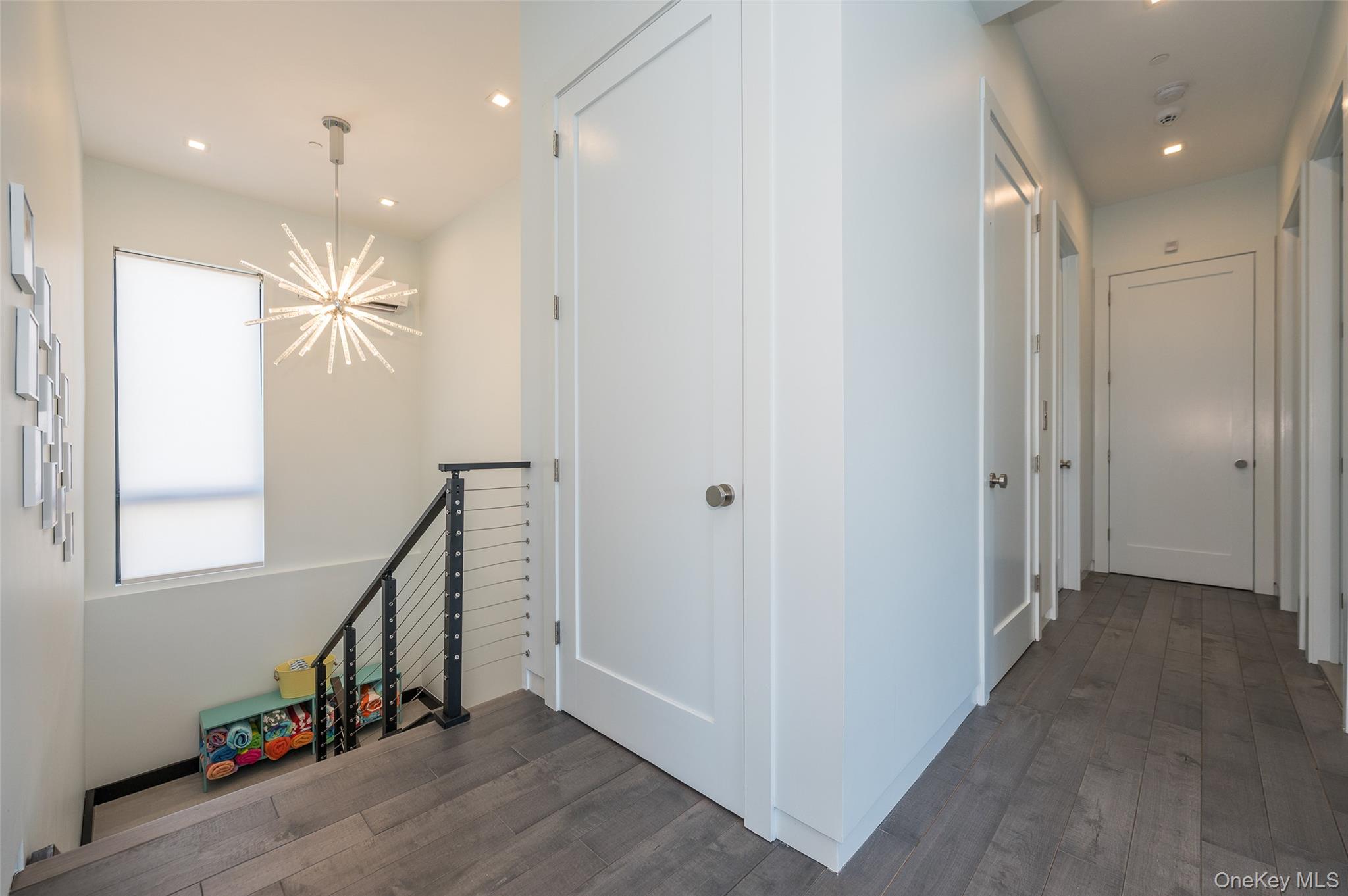 46 Nantwick Street Lido Beach, NY 11561 - Photo 34 of 50 a view of a hallway with wooden floor and staircase