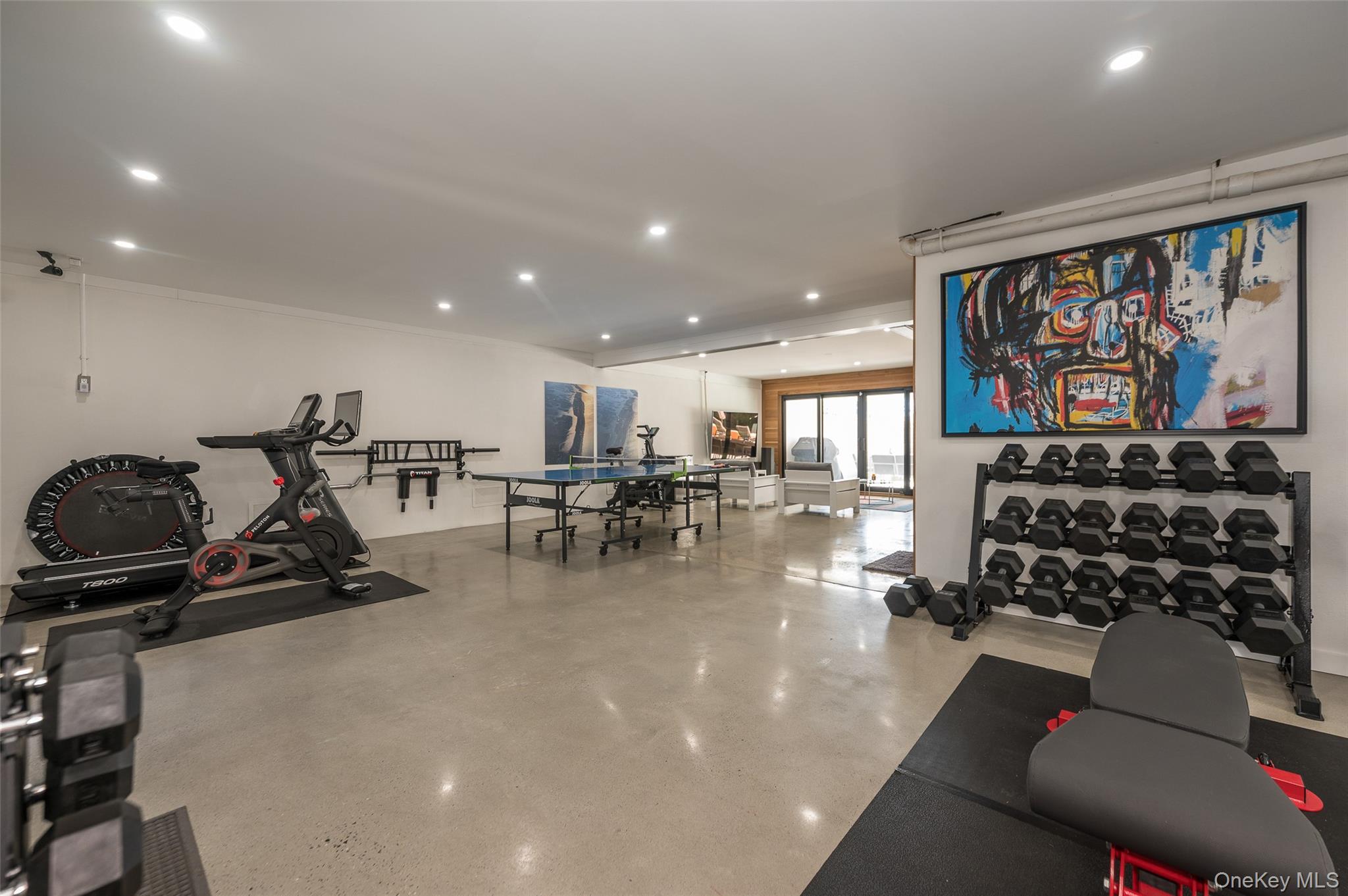 46 Nantwick Street Lido Beach, NY 11561 - Photo 36 of 50 a gym room with gym equipment and a large window