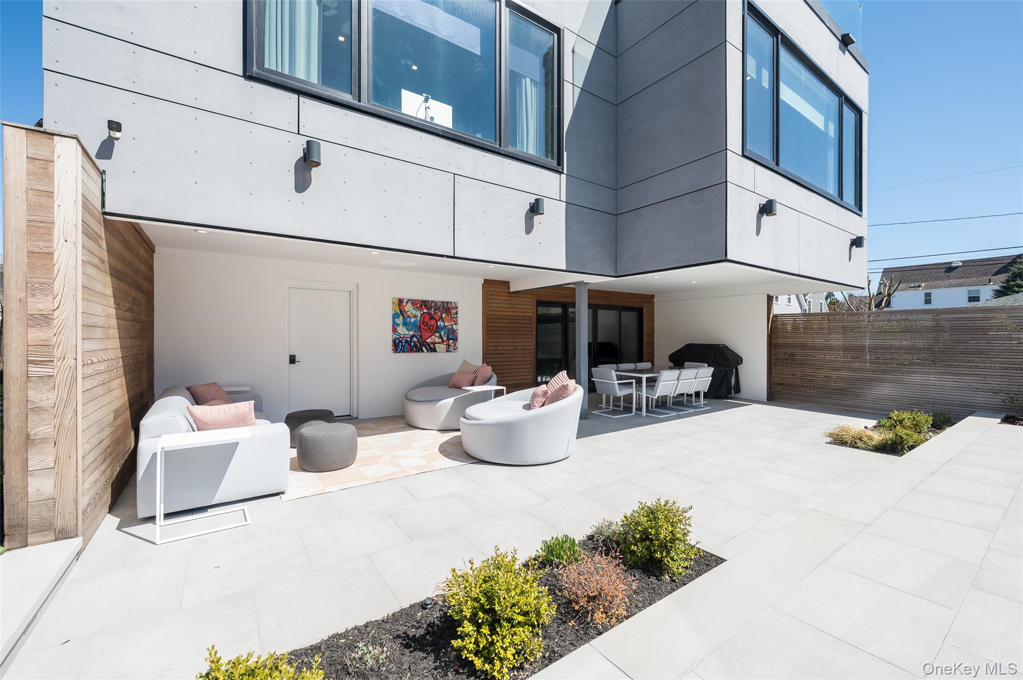 46 Nantwick Street Lido Beach, NY 11561 - Photo 44 of 50 a view of a patio with plants and chairs