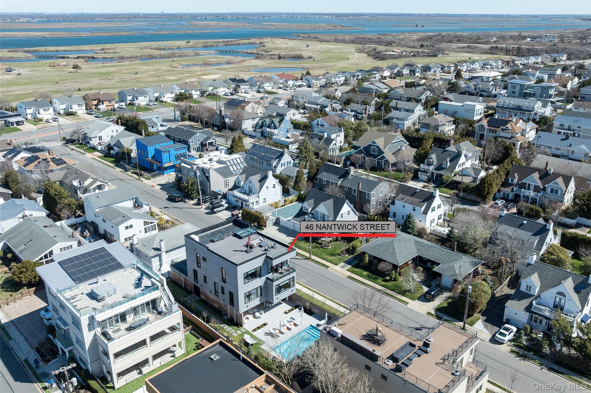 46 Nantwick Street Lido Beach, NY 11561 - Photo 49 of 50 an aerial view of a city with lots of residential buildings and ocean view