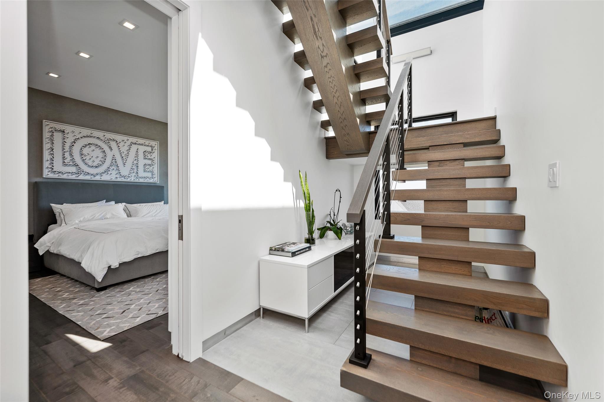 46 Nantwick Street Lido Beach, NY 11561 - Photo 7 of 50 a living room with furniture and stairs