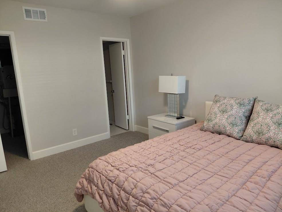1951 Northeast 39th Street, Unit 127 Lighthouse Point, FL 33064 - Photo 16 of 36 Master Bedroom