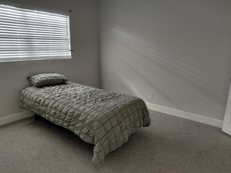 1951 Northeast 39th Street, Unit 127 Lighthouse Point, FL 33064 - Photo 19 of 36 Guest Bedroom