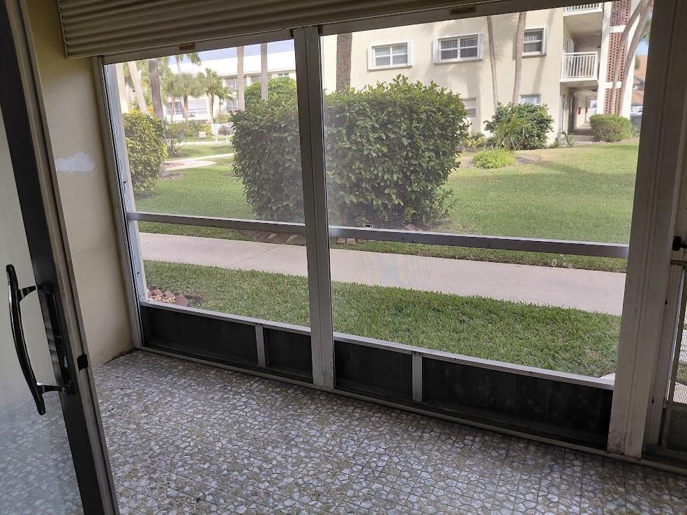 1951 Northeast 39th Street, Unit 127 Lighthouse Point, FL 33064 - Photo 20 of 36 Screened patio