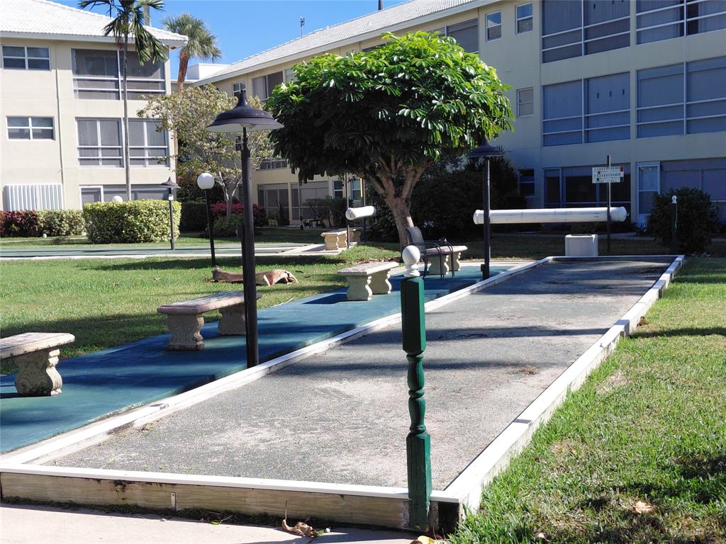 1951 Northeast 39th Street, Unit 127 Lighthouse Point, FL 33064 - Photo 29 of 36 BOCCI BALL COURT