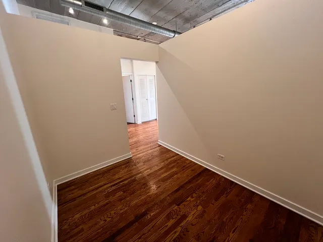 a view of small space with wooden floor