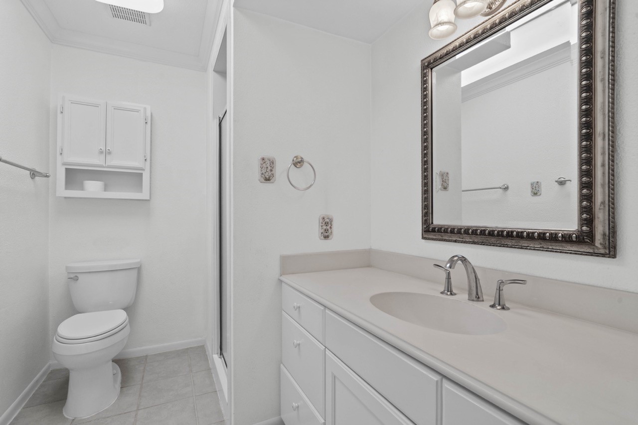 702 3rd Street Humble, TX 77338 - Photo 43 of 44 Full guest bathroom offering a standup shower. This bathroom services bedroom #2 and guest.