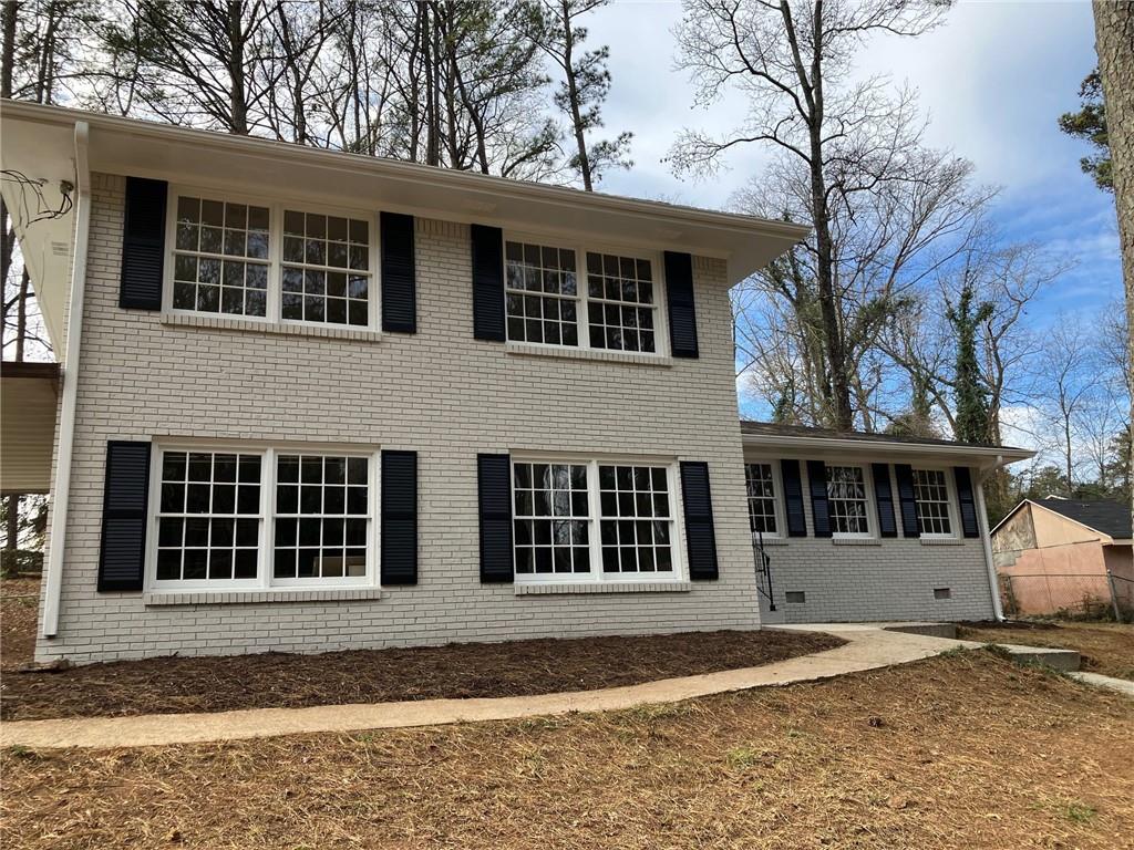 2808 Elkhorn Drive Decatur, GA 30034 - Photo 1 of 1 a view of a house with a large tree