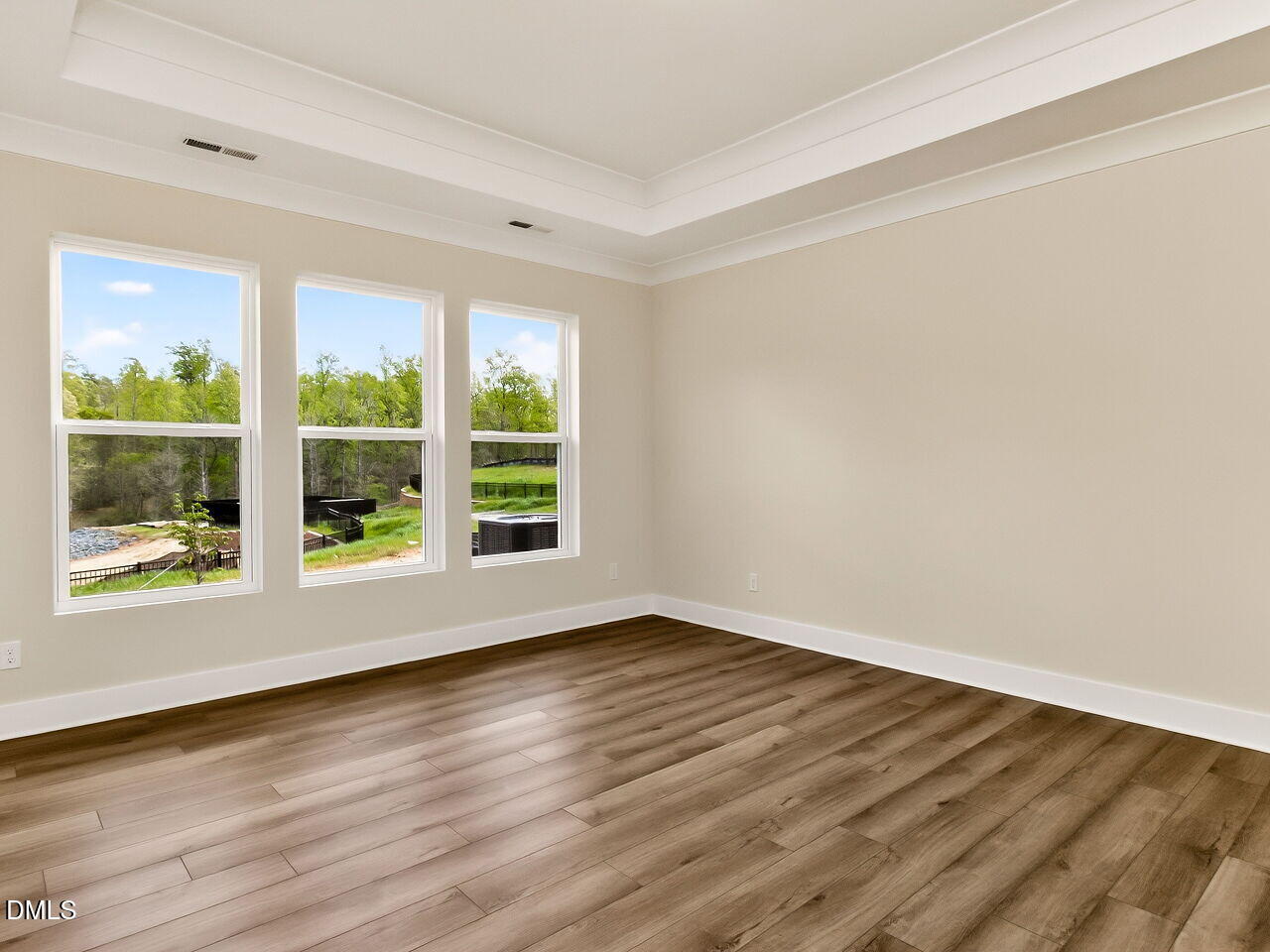 62 Raspberry Run Pittsboro, NC 27312 - Photo 12 of 55 a view of an empty room with wooden floor and a window