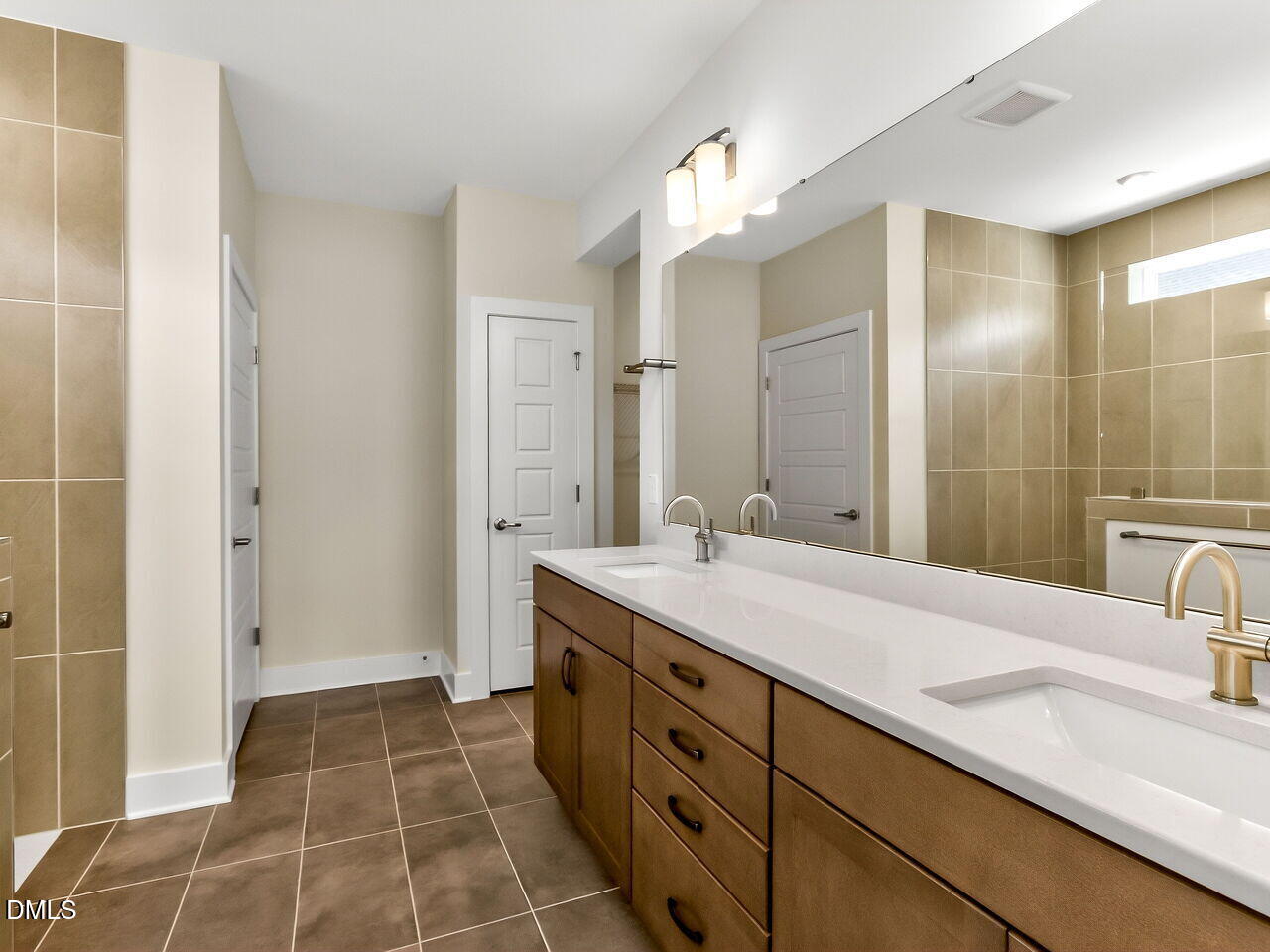62 Raspberry Run Pittsboro, NC 27312 - Photo 15 of 55 a spacious bathroom with a double vanity sink mirror and a shower