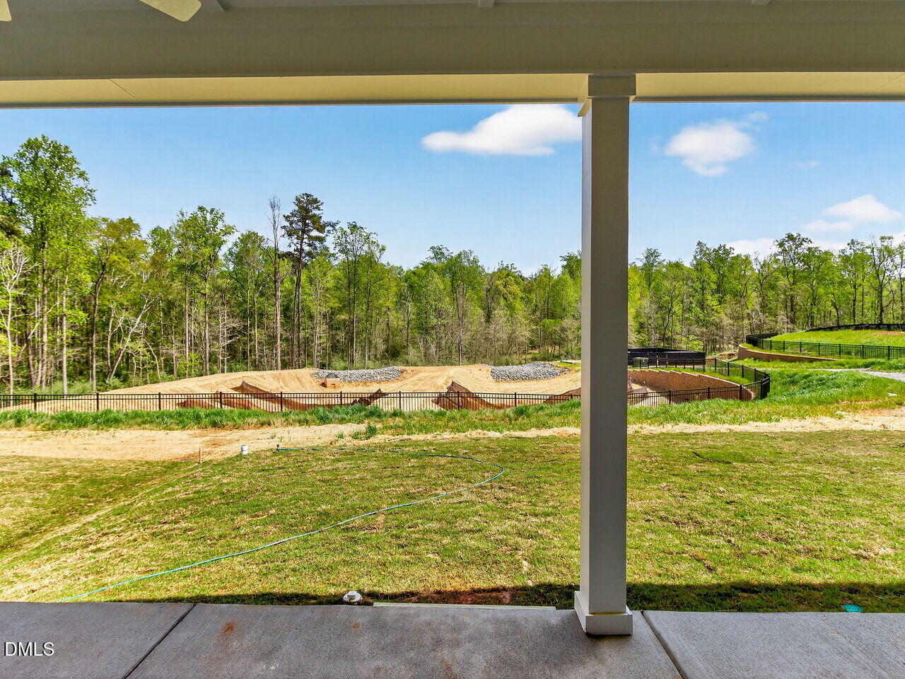 62 Raspberry Run Pittsboro, NC 27312 - Photo 28 of 55 a view of a swimming pool with an outdoor space and seating area