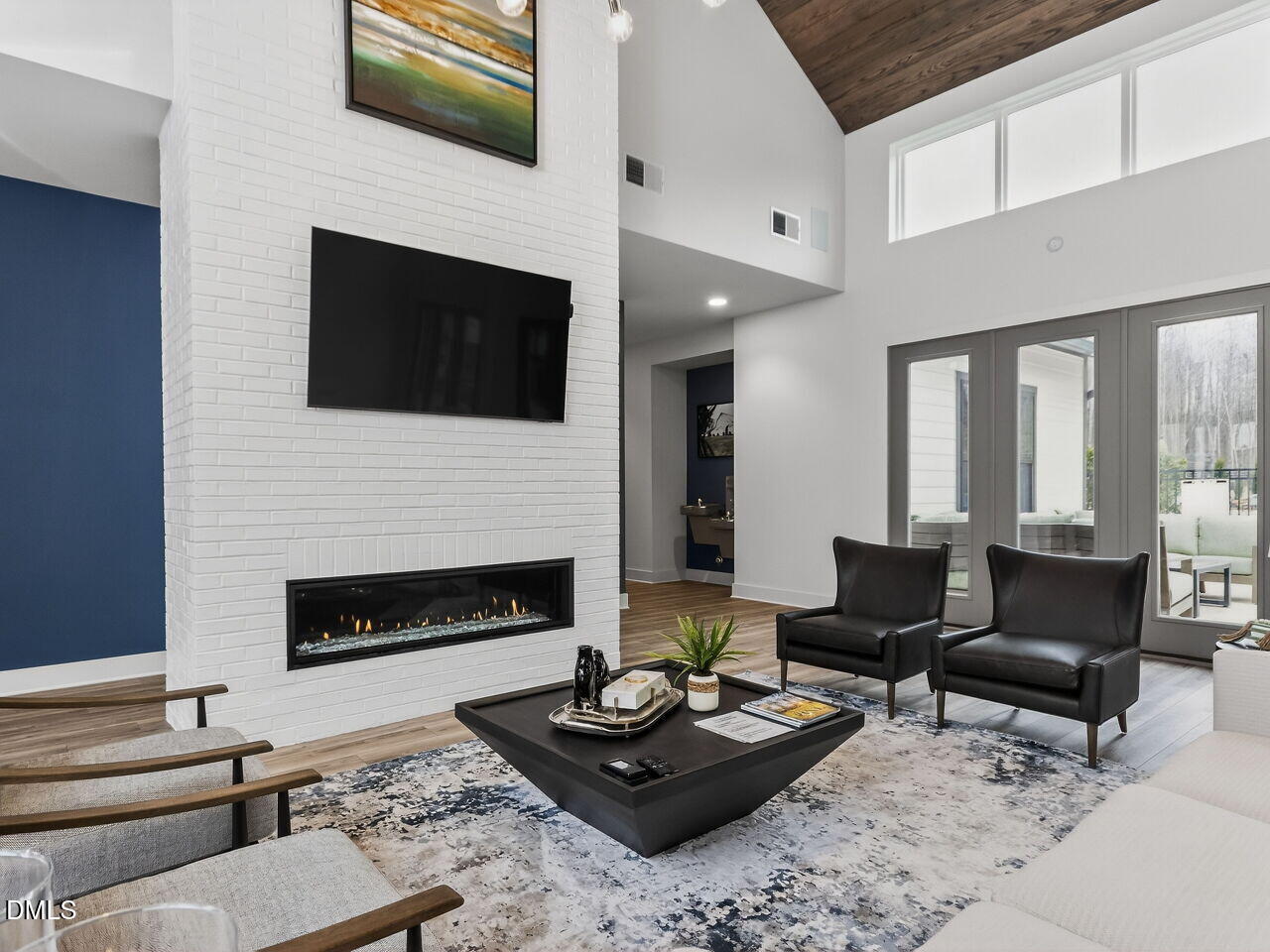 62 Raspberry Run Pittsboro, NC 27312 - Photo 35 of 55 a living room with furniture a fireplace and a flat screen tv