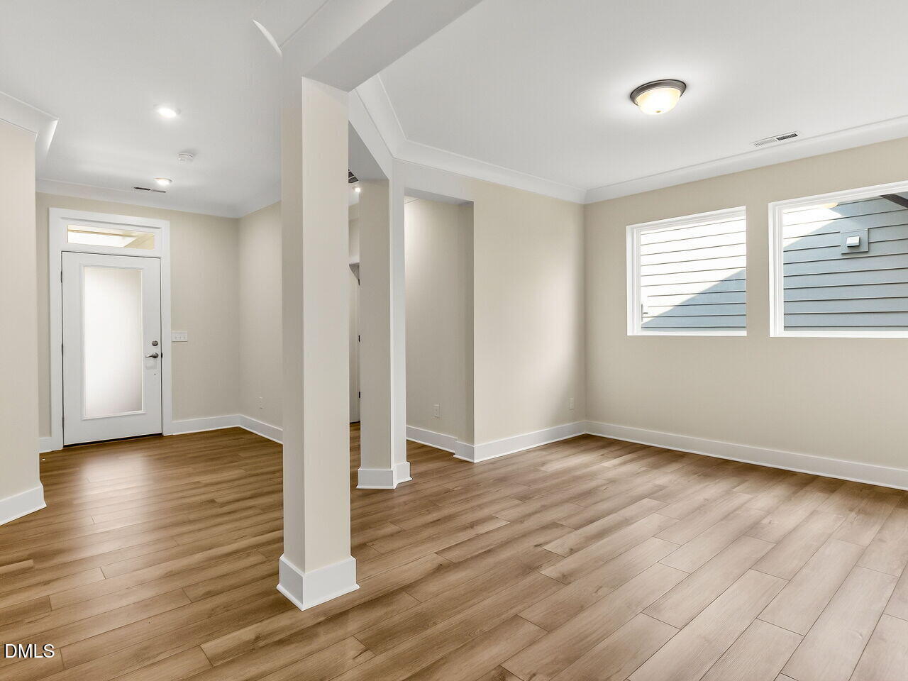 62 Raspberry Run Pittsboro, NC 27312 - Photo 4 of 55 an empty room with wooden floor and windows