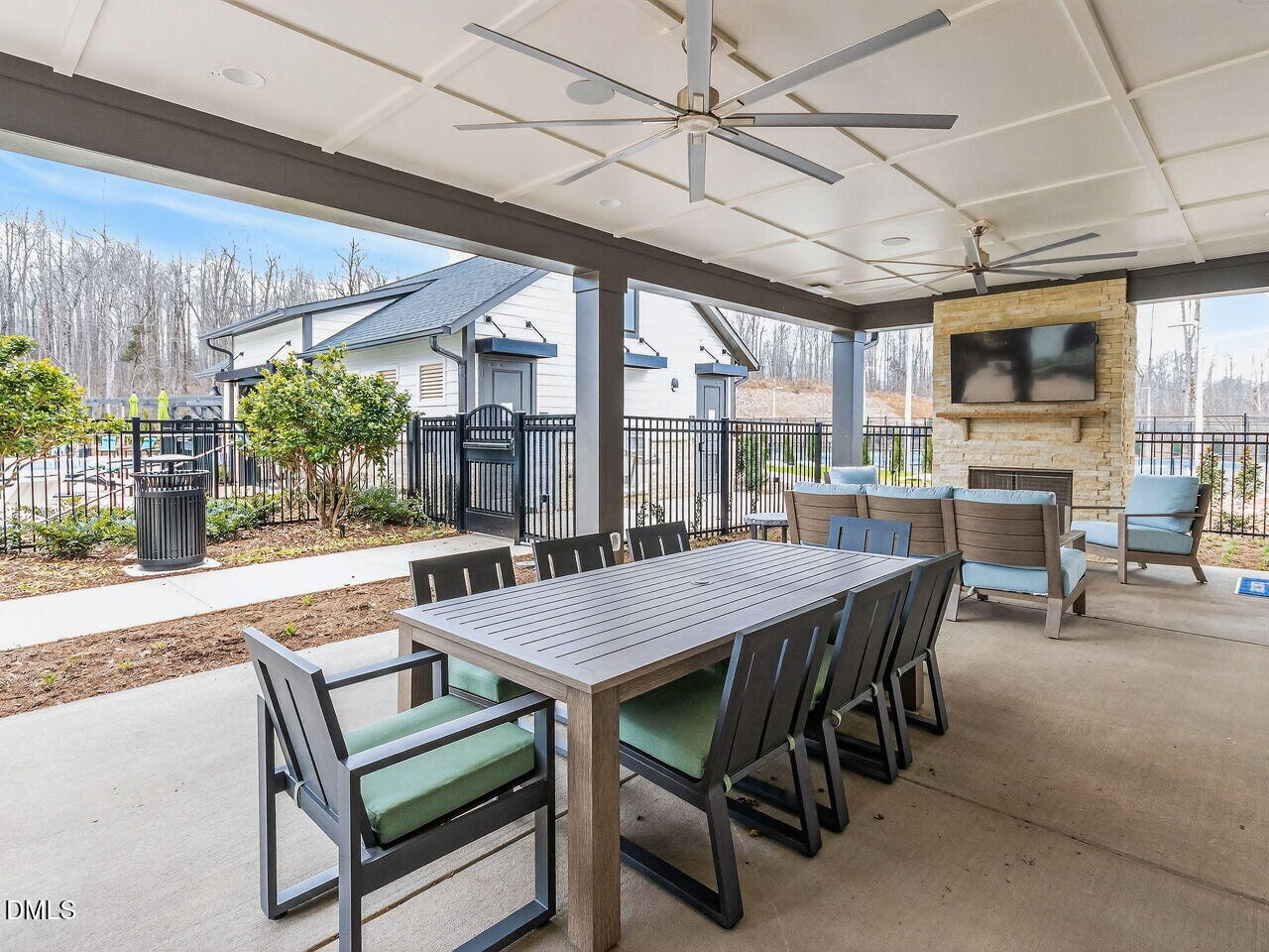62 Raspberry Run Pittsboro, NC 27312 - Photo 43 of 55 a view of a dining table and chairs in patio