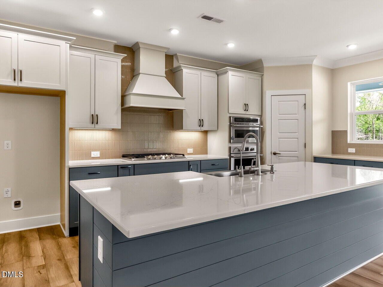 62 Raspberry Run Pittsboro, NC 27312 - Photo 9 of 55 a kitchen with stainless steel appliances granite countertop a sink dishwasher a stove and a refrigerator