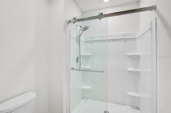 a view of a room with racks on the wall