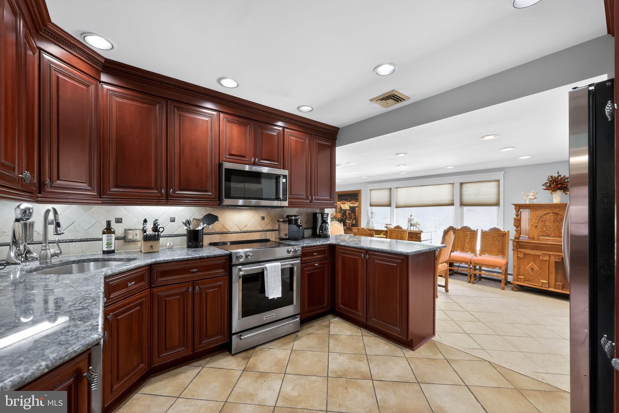 821 Beverly Road Rydal, PA 19046 - Photo 17 of 37 a kitchen with lots of appliances and cabinets
