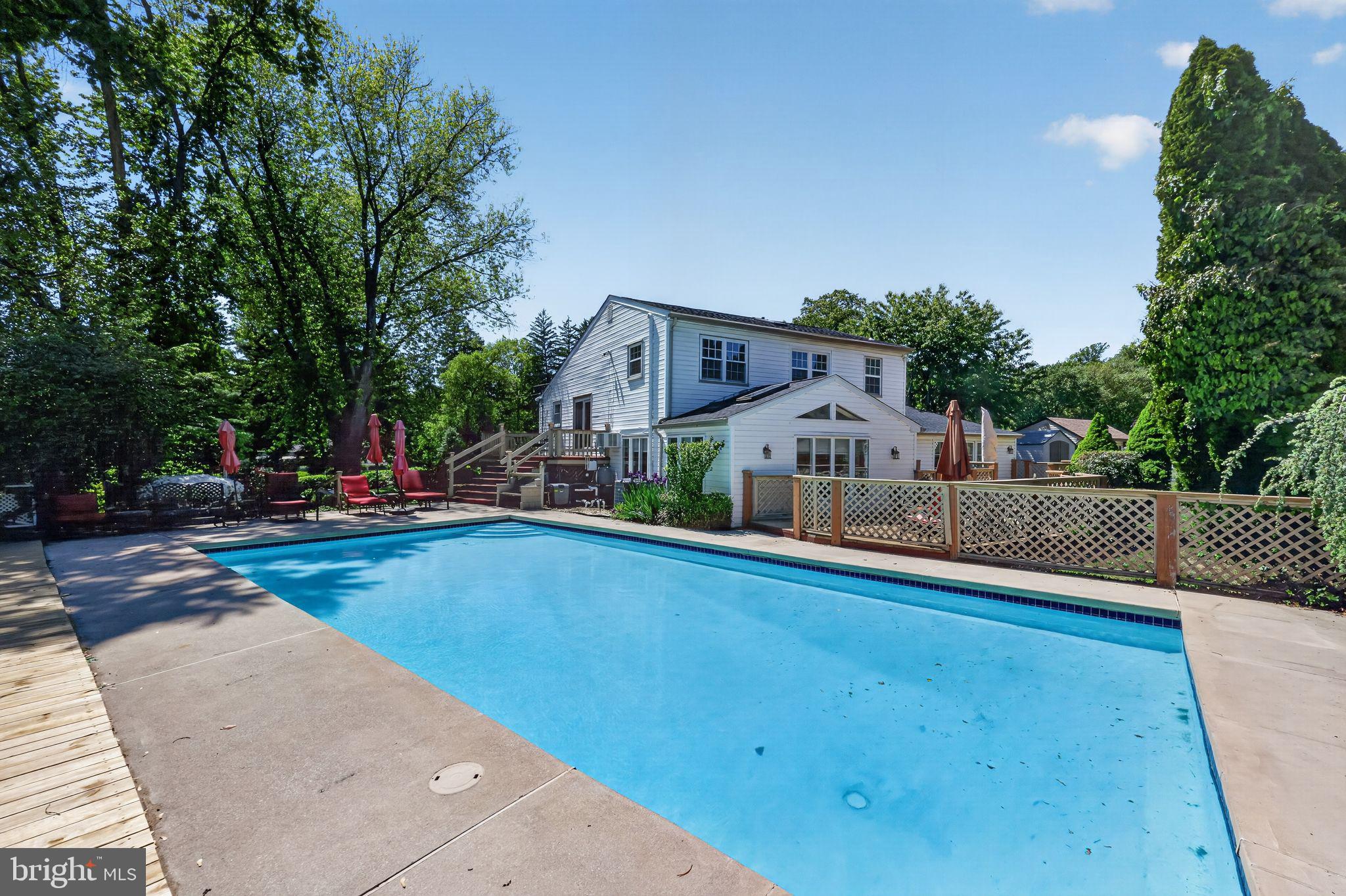 821 Beverly Road Rydal, PA 19046 - Photo 7 of 37 a view of a house with a swimming pool