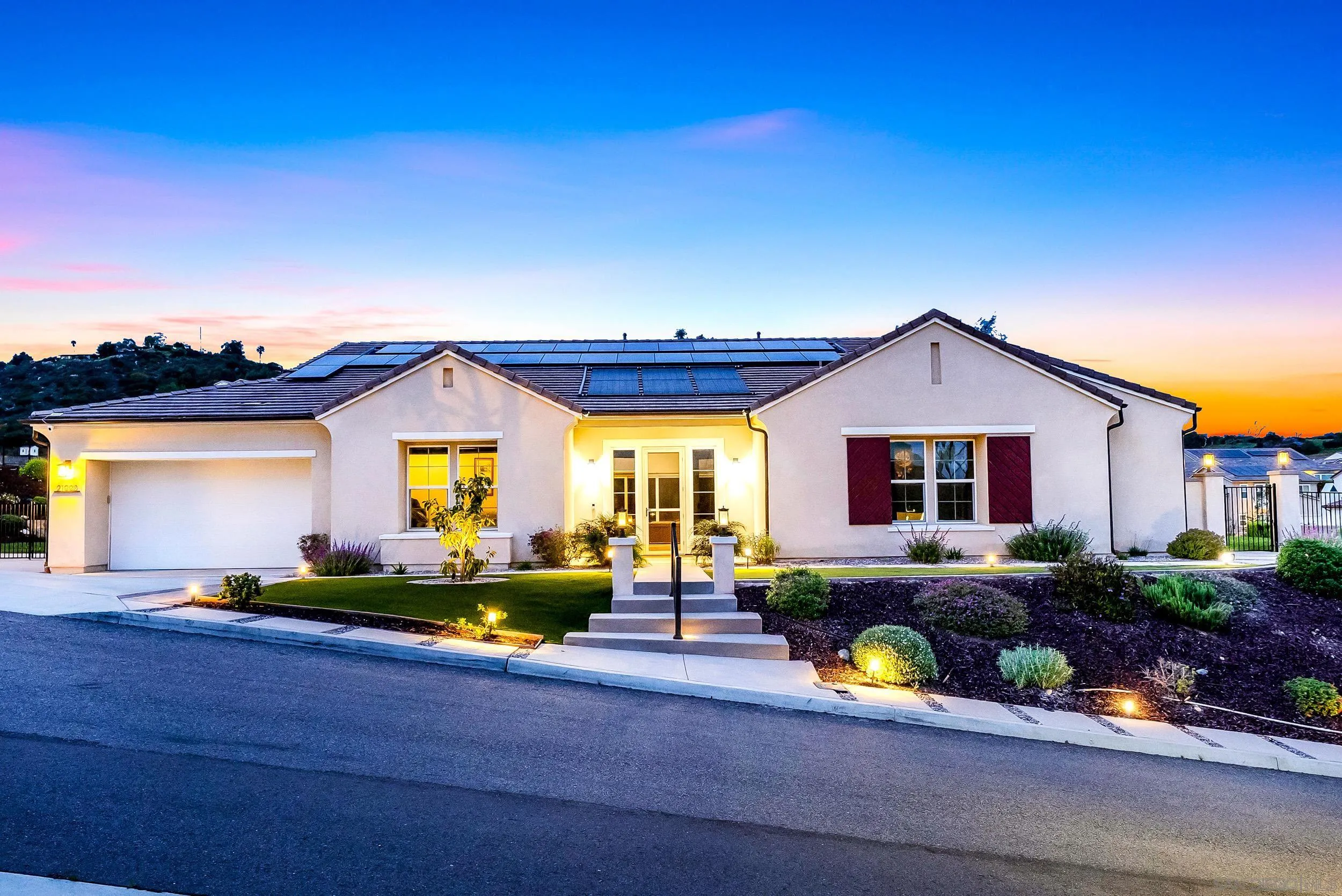 a front view of house with yard outdoor seating and green space