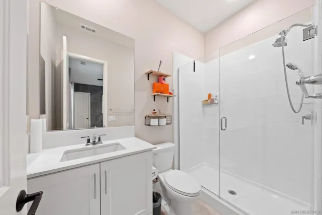 a utility room with sink dryer and washer