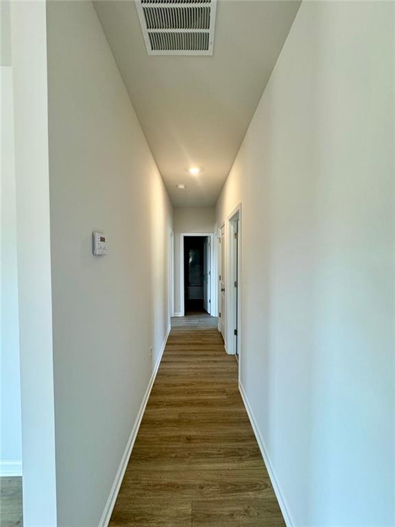 883 Dortch Road Eastanollee, GA 30538 - Photo 11 of 29 a view of a hallway with wooden floor and staircase