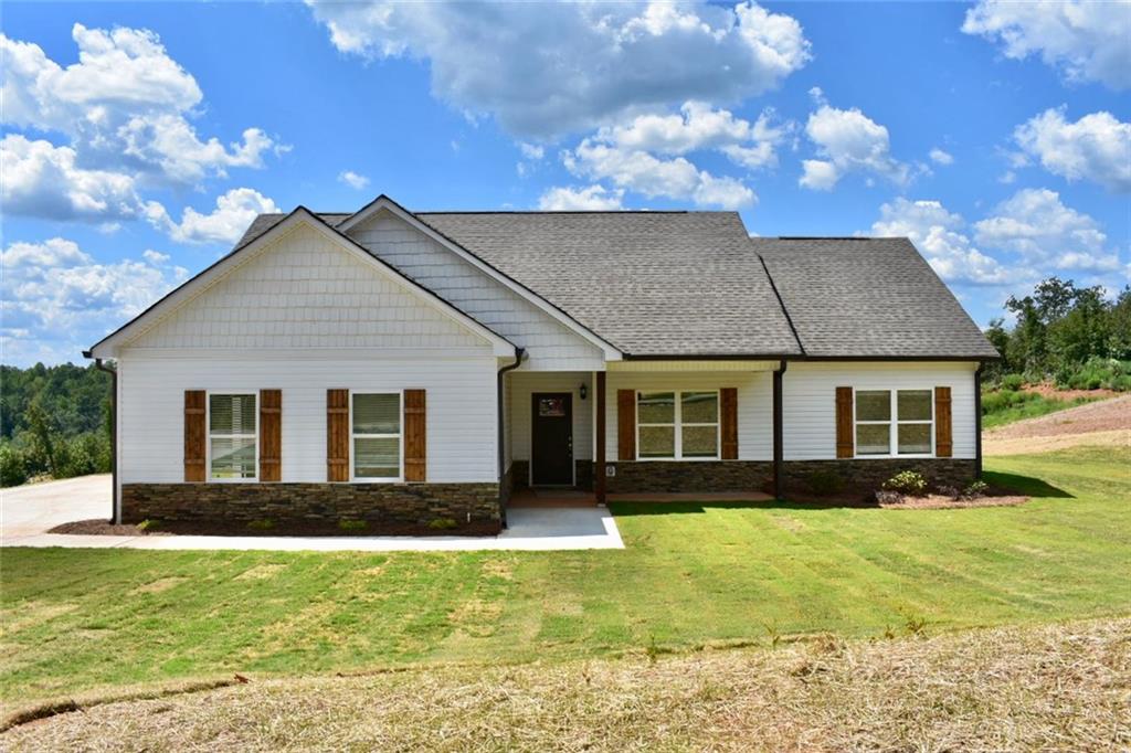 883 Dortch Road Eastanollee, GA 30538 - Photo 2 of 29 a front view of house with yard and trees around