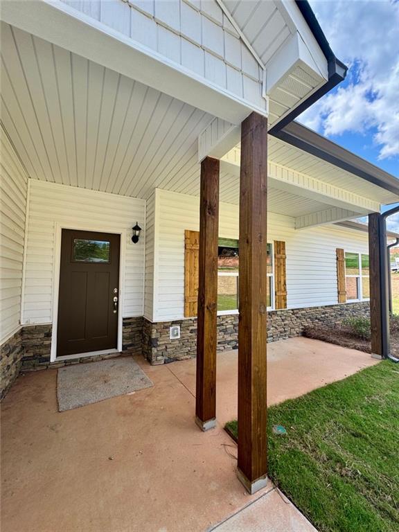 883 Dortch Road Eastanollee, GA 30538 - Photo 24 of 29 a view of a house with backyard and porch