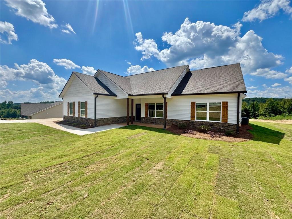 883 Dortch Road Eastanollee, GA 30538 - Photo 25 of 29 a front view of a house with a yard