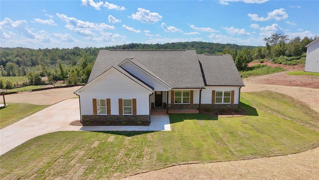 883 Dortch Road Eastanollee, GA 30538 - Photo 28 of 29 a view of house with yard and mountain view in back