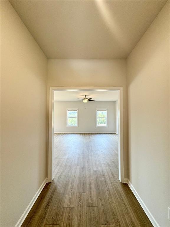 883 Dortch Road Eastanollee, GA 30538 - Photo 8 of 29 a view of a hallway with wooden floor