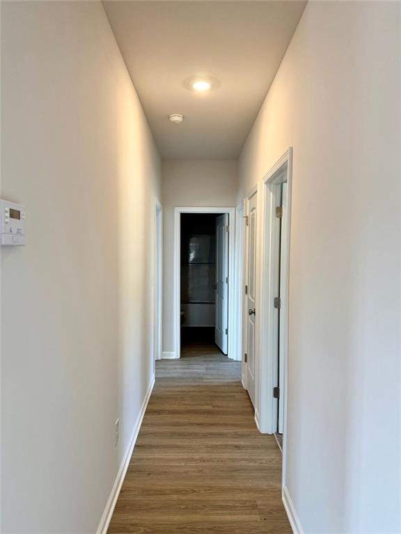 883 Dortch Road Eastanollee, GA 30538 - Photo 10 of 29 a view of a hallway with wooden floor