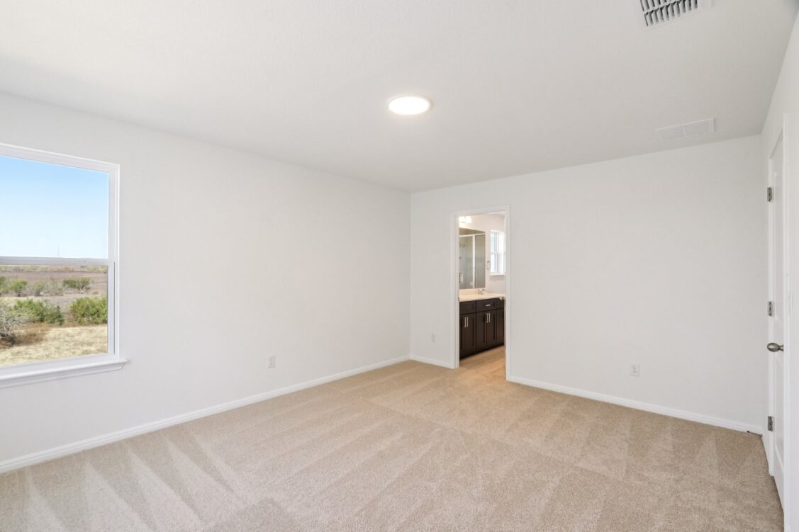 11224 Zip Cochise Way Manor, TX 78653 - Photo 32 of 40 an empty room with windows