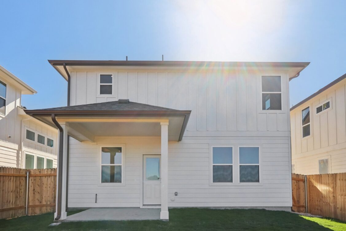 11224 Zip Cochise Way Manor, TX 78653 - Photo 40 of 40 a front view of a house with a yard