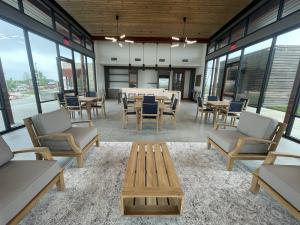 11224 Zip Cochise Way Manor, TX 78653 - Photo 3 of 40 a view of a dining room with furniture window and outside view