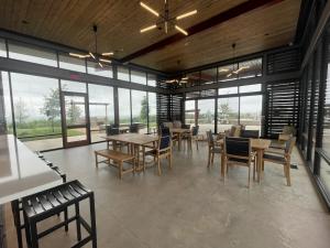 11224 Zip Cochise Way Manor, TX 78653 - Photo 6 of 40 a view of a dining room with furniture window and outside view