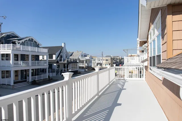 a bedroom with bed and a window