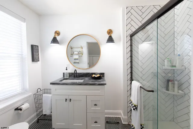 a utility room with sink dryer and washer