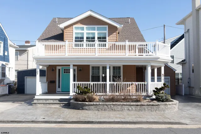 a view of a balcony with furniture