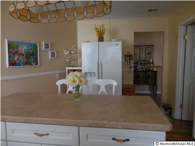 12 Phillips Road Brick, NJ 08724 - Photo 5 of 19 a view of a dining room with furniture