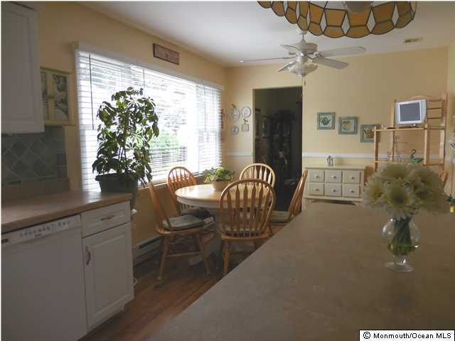 12 Phillips Road Brick, NJ 08724 - Photo 6 of 19 a living room with furniture and a large window